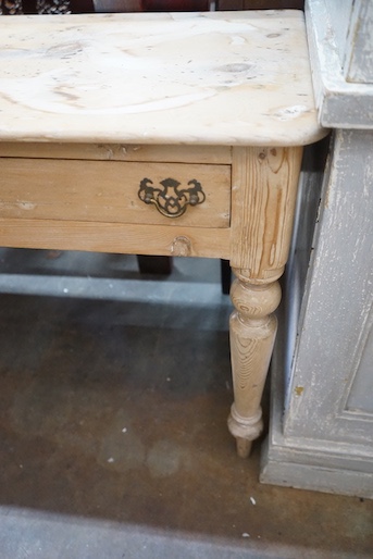 A Victorian pine two drawer side table, width 104cm, depth 52cm, height 72cm